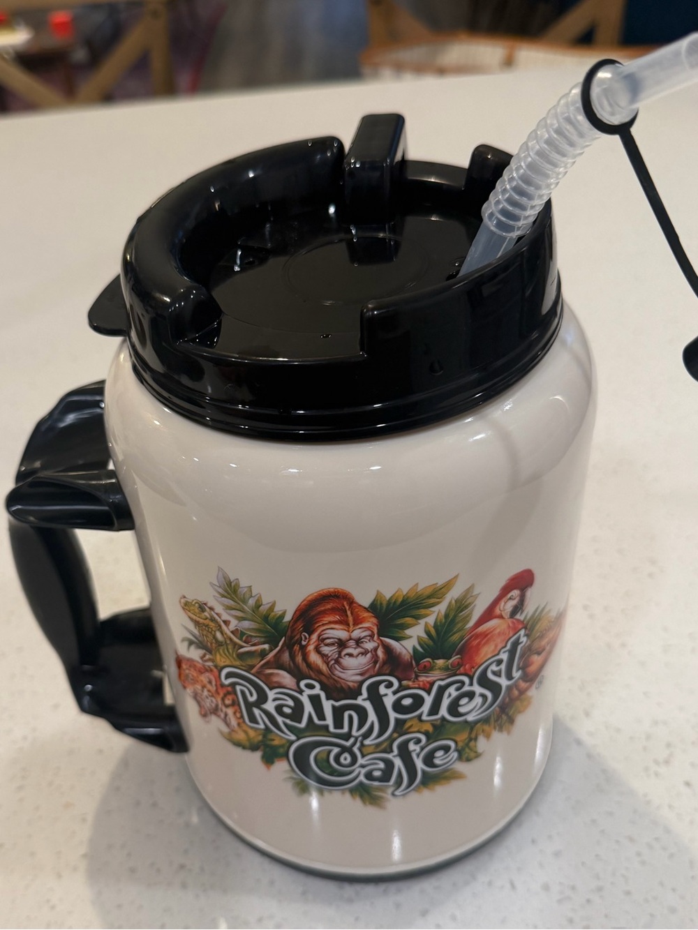 Rainforest Cafe White Travel Mug with Black Lid and Handle